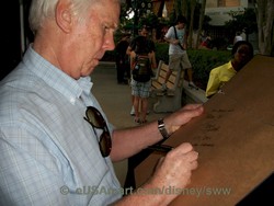 Jeremy Bulloch the Star Wars actor who played Buba Fett signing the Star Wars Weekends 2010 1st Official Colored Sketch titled "Donald as Boba Fett" by Jason Zucker at the SWW event in Hollywood Studios